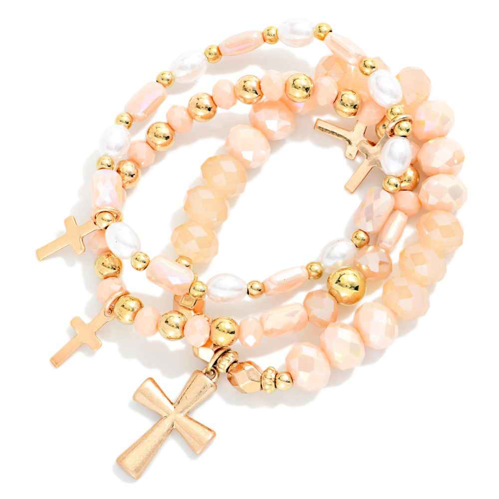 Set Of Three Beaded Stretch Bracelets Featuring Faceted Beads, Pearls, & Cross Charms