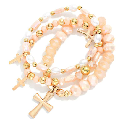 Set Of Three Beaded Stretch Bracelets Featuring Faceted Beads, Pearls, & Cross Charms