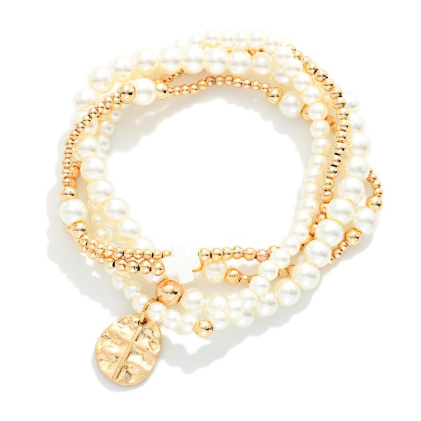 Set Of Four Metal Tone & Pearl Beaded Stretch Bracelets Hammered Metal Cross Medallion 444362