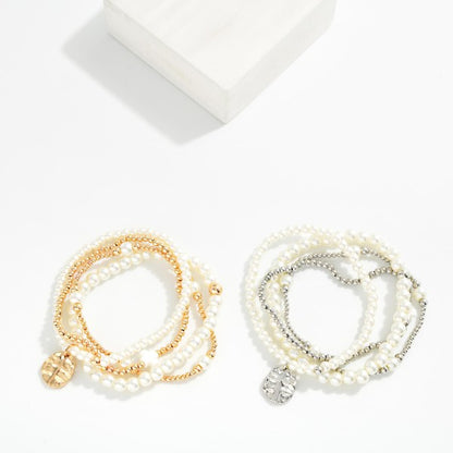 Set Of Four Metal Tone & Pearl Beaded Stretch Bracelets Hammered Metal Cross Medallion 444362