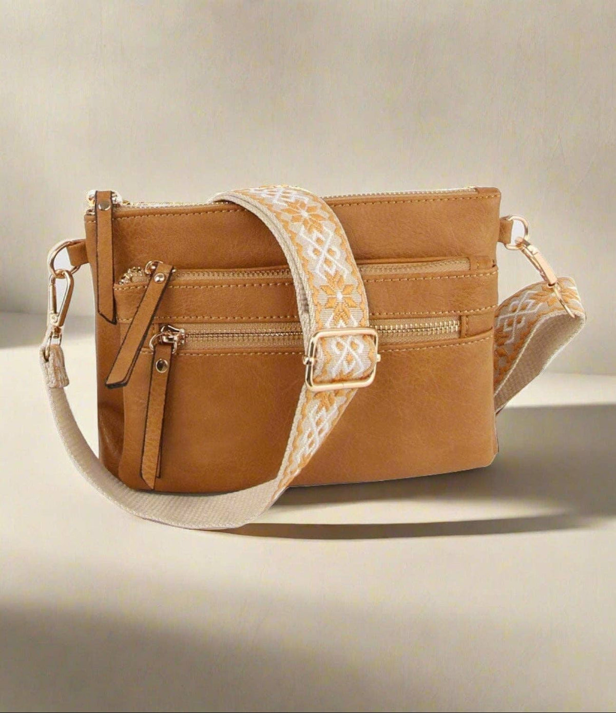 LQ342-Z Melissa Multi Zip Pocket Crossbody With Guitar Strap